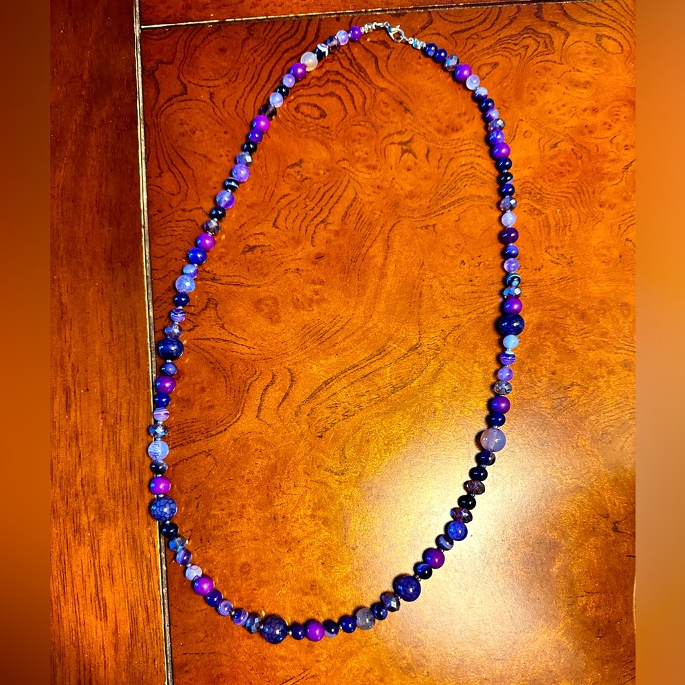 Beautiful handmade stone necklace. Approximately 28” long. NEW. Purple.
